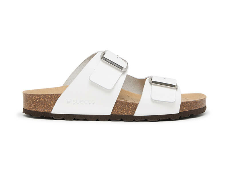 Suecos damesslipper zijaanzicht beige bruine zool witte bandjes