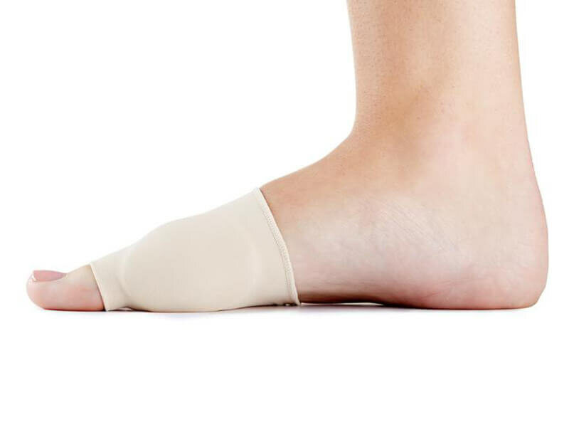 Zijaanzicht beschermingkous met gelkussentje voor hallux valgus