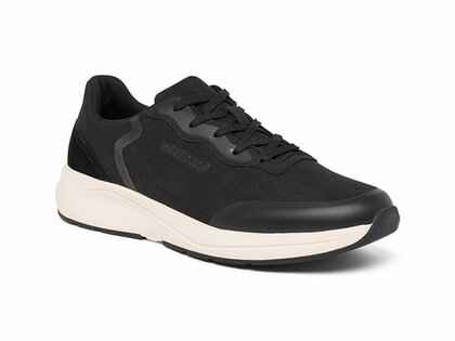 Suecos anti slip schoen vinter zwart met witte zool vooraanzicht